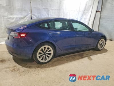 Trzecie zdjęcie samochodu z tyłu: 2022 TESLA MODEL 3 VIN:5YJ3E1EA1NF190874 - miniatura