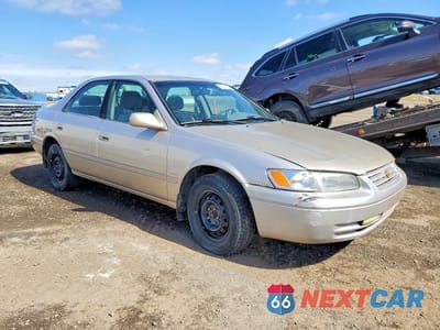 Czwarte zdjęcie samochodu z boku: 1999 TOYOTA CAMRY LE VIN:4T1BG22K5XU453124 - miniatura