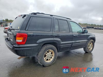 Trzecie zdjęcie samochodu z tyłu: 1999 JEEP GRAND CHEROKEE LIMITED VIN:1J4GW68S3XC615263 - miniatura