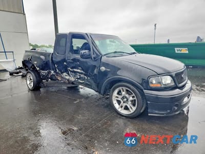 Czwarte zdjęcie samochodu z boku: 2000 FORD F150 VIN:2FTRX07L2YCB02326 - miniatura