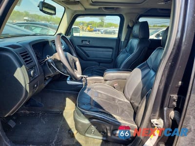 Zdjęcie 7 z 12 samochodu: 2009 HUMMER H3 VIN:5GTEN13E098101664 - miniatura