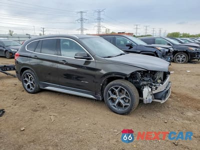 Czwarte zdjęcie samochodu z boku: 2017 BMW X1 XDRIVE28I VIN:WBXHT3C35H5F71067 - miniatura