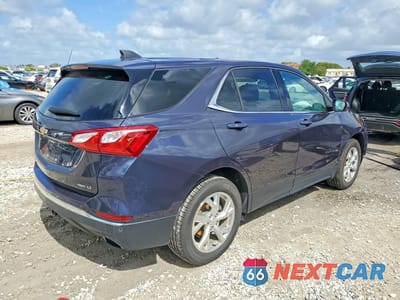 Trzecie zdjęcie samochodu z tyłu: 2018 CHEVROLET EQUINOX LT VIN:3GNAXTEX1JS555323 - miniatura