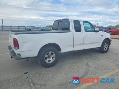 Trzecie zdjęcie samochodu z tyłu: 2000 FORD F150 VIN:1FTRX17L1YKA73161 - miniatura