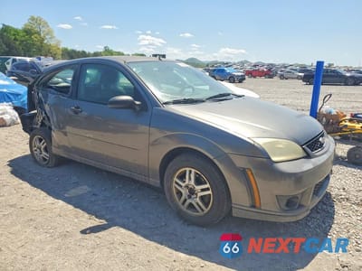 Czwarte zdjęcie samochodu z boku: 2006 FORD FOCUS ZX3 VIN:1FAHP31N86W201876 - miniatura