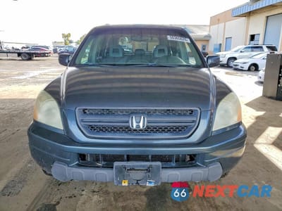Piąte zdjęcie samochodu w środku: 2005 HONDA PILOT EXL VIN:2HKYF18725H525807 - miniatura