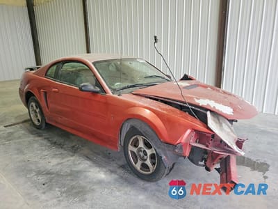Czwarte zdjęcie samochodu z boku: 2002 FORD MUSTANG VIN:1FAFP40462F215940 - miniatura