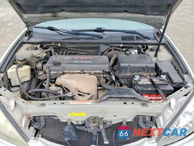 Zdjęcie 11 z 11 samochodu: 2003 TOYOTA CAMRY LE VIN:4T1BE32K63U669070 - miniatura