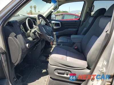 Zdjęcie 7 z 12 samochodu: 2006 HONDA RIDGELINE RTS VIN:2HJYK16476H576018 - miniatura