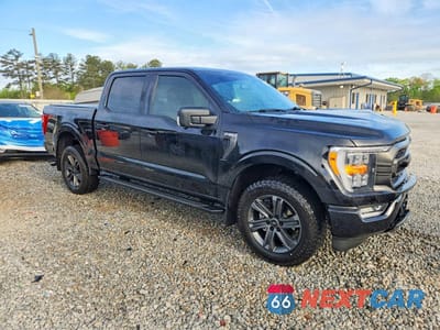 Czwarte zdjęcie samochodu z boku: 2023 FORD F150 SUPERCREW VIN:1FTFW1E87PFB92957 - miniatura