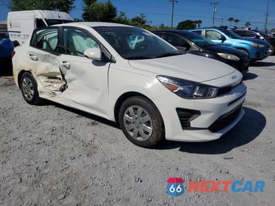 Czwarte zdjęcie samochodu z boku: 2023 KIA RIO S VIN:3KPA24AD0PE603099 - miniatura