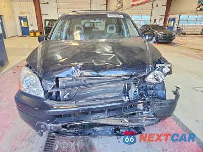 Piąte zdjęcie samochodu w środku: 2005 HONDA PILOT EXL VIN:5FNYF185X5B052736 - miniatura