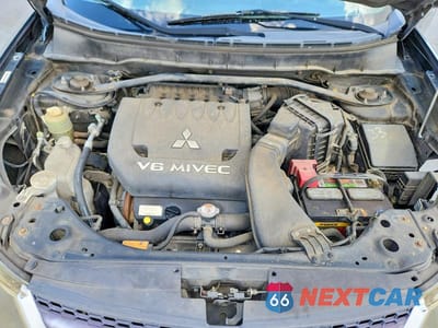 Zdjęcie 12 z 13 samochodu: 2007 MITSUBISHI OUTLANDER ES VIN:JA4MS31X77Z003843 - miniatura