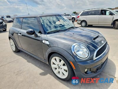 Czwarte zdjęcie samochodu z boku: 2011 MINI COOPER S VIN:WMWSV3C54BTY15934 - miniatura