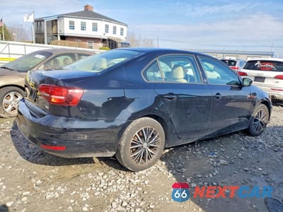 Trzecie zdjęcie samochodu z tyłu: 2018 VOLKSWAGEN JETTA SE VIN:3VWDB7AJ6JM236045 - miniatura