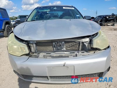 Piąte zdjęcie samochodu w środku: 2009 FORD FOCUS S VIN:1FAHP34N19W102719 - miniatura