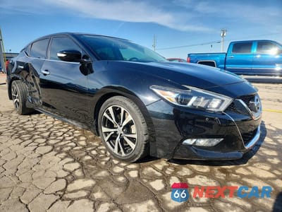 Czwarte zdjęcie samochodu z boku: 2017 NISSAN MAXIMA 3.5 SL VIN:1N4AA6AP9HC445515 - miniatura