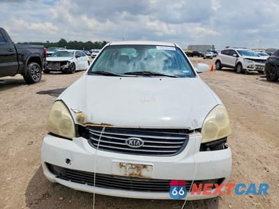 Piąte zdjęcie samochodu w środku: 2007 KIA OPTIMA LX VIN:KNAGE123X75094928 - miniatura
