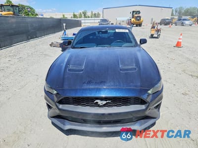 Piąte zdjęcie samochodu w środku: 2021 FORD MUSTANG VIN:1FA6P8TH8M5156033 - miniatura