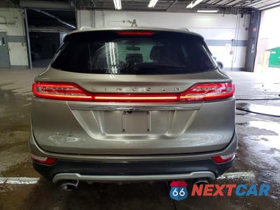 Zdjęcie 6 z 13 samochodu: 2019 LINCOLN MKC SELECT VIN:5LMCJ2C96KUL39799 - miniatura