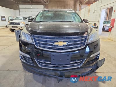 Piąte zdjęcie samochodu w środku: 2017 CHEVROLET TRAVERSE PREMIER VIN:1GNKVJKD3HJ137656 - miniatura