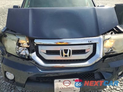 Zdjęcie 12 z 13 samochodu: 2011 HONDA PILOT EXL VIN:5FNYF4H5XBB057786 - miniatura