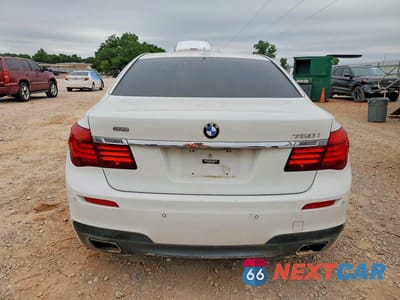 Zdjęcie 6 z 12 samochodu: 2015 BMW 750 I VIN:WBAYA8C56FD825805 - miniatura