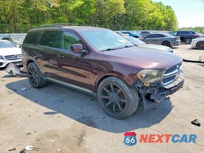 Czwarte zdjęcie samochodu z boku: 2012 DODGE DURANGO SXT VIN:1C4RDJAG0CC278784 - miniatura