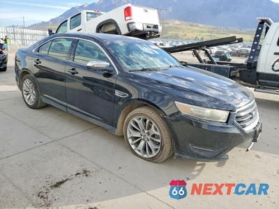 Czwarte zdjęcie samochodu z boku: 2013 FORD TAURUS LIMITED VIN:1FAHP2F81DG195987 - miniatura