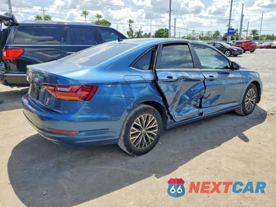 Trzecie zdjęcie samochodu z tyłu: 2019 VOLKSWAGEN JETTA S VIN:3VWC57BU9KM117046 - miniatura