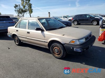 Czwarte zdjęcie samochodu z boku: 1991 TOYOTA COROLLA BASE VIN:1NXAE91AXMZ241740 - miniatura