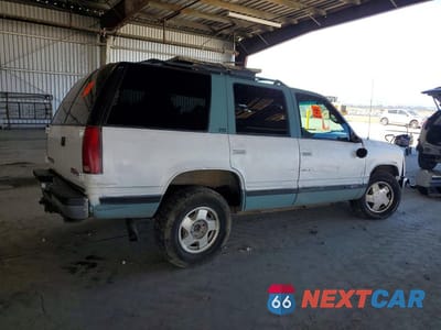 Trzecie zdjęcie samochodu z tyłu: 1995 GMC YUKON VIN:1GKEK13K6SJ752659 - miniatura