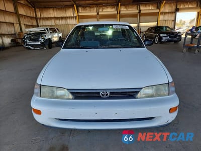 Piąte zdjęcie samochodu w środku: 1995 TOYOTA COROLLA DX VIN:1NXAE09B0SZ312417 - miniatura