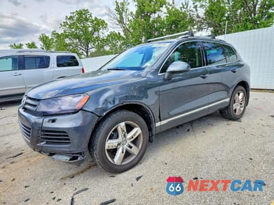 2014 VOLKSWAGEN TOUAREG V6 WVGEF9BP1ED014715 - główne zdjęcie licytacji z USA - miniatura