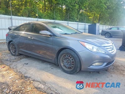 Czwarte zdjęcie samochodu z boku: 2012 HYUNDAI SONATA LIMITED VIN:5NPEC4AC6CH313719 - miniatura