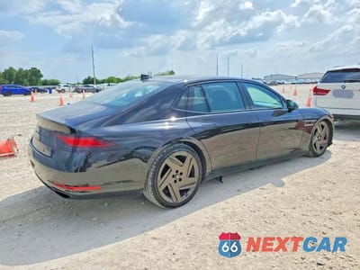 Trzecie zdjęcie samochodu z tyłu: 2026 GENESIS G90 PRESTIGE BLACK VIN:KMTFD4SDXTU057388 - miniatura