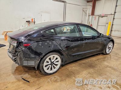 Trzecie zdjęcie samochodu z tyłu: 2022 TESLA MODEL 3 VIN:5YJ3E1EB9NF290603 - miniatura
