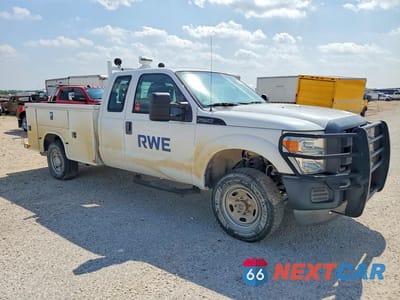 Czwarte zdjęcie samochodu z boku: 2014 FORD F250 SUPER DUTY VIN:1FT7X2B66EEB35937 - miniatura