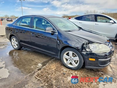 Czwarte zdjęcie samochodu z boku: 2009 VOLKSWAGEN JETTA SE VIN:3VWRZ71K79M142956 - miniatura