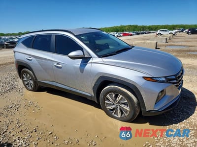 Czwarte zdjęcie samochodu z boku: 2022 HYUNDAI TUCSON BLUE VIN:KM8JBCA14NU030783 - miniatura