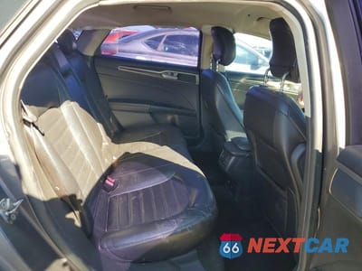 Zdjęcie 10 z 12 samochodu: 2013 FORD FUSION SE HYBRID VIN:3FA6P0LU5DR261009 - miniatura