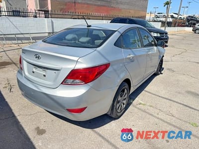Czwarte zdjęcie samochodu z boku: 2015 HYUNDAI ACCENT GLS VIN:KMHCT4AE3FU922202 - miniatura