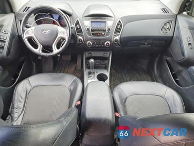 Zdjęcie 8 z 12 samochodu: 2011 HYUNDAI TUCSON GLS VIN:KM8JUCAC9BU156922 - miniatura
