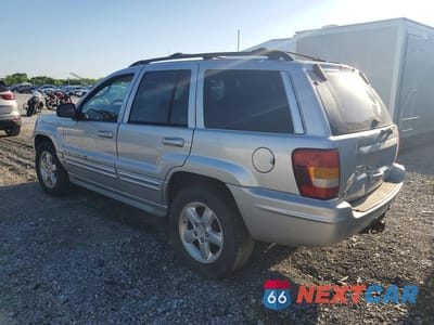 Drugie zdjęcie samochodu z przodu: 2003 JEEP GRAND CHEROKEE OVERLAND VIN:1J8GW68J93C532310 - miniatura