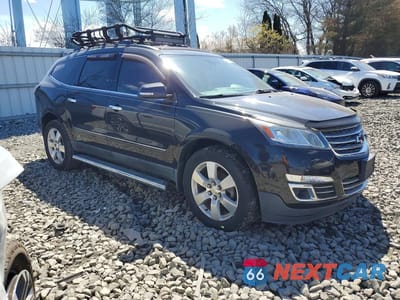 Czwarte zdjęcie samochodu z boku: 2015 CHEVROLET TRAVERSE LTZ VIN:1GNKVJKD0FJ286510 - miniatura