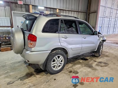 Trzecie zdjęcie samochodu z tyłu: 2002 TOYOTA RAV4 BASE VIN:JTEGH20V720077820 - miniatura