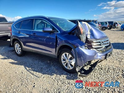 Czwarte zdjęcie samochodu z boku: 2014 HONDA CR-V VIN:2HKRM4H70EH657685 - miniatura