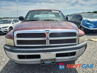 Piąte zdjęcie samochodu w środku: 2000 DODGE RAM 1500 VIN:3B7HC12Y9YG131017 - miniatura