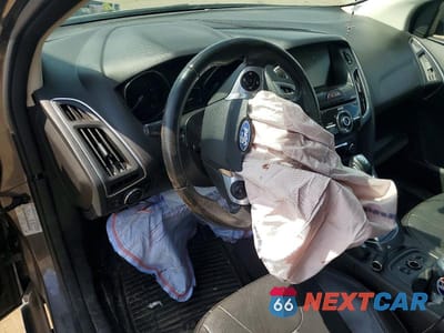 Zdjęcie 8 z 11 samochodu: 2014 FORD FOCUS TITANIUM VIN:1FADP3J21EL116950 - miniatura