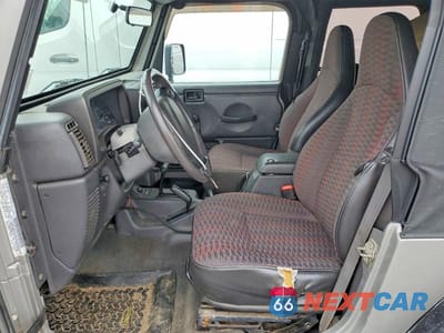 Zdjęcie 7 z 12 samochodu: 2000 JEEP WRANGLER / TJ SPORT VIN:1J4FA49S0YP729650 - miniatura